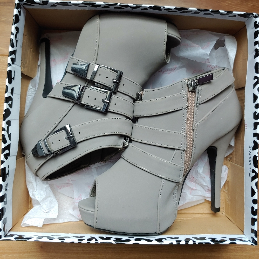 Gray high heeled booties